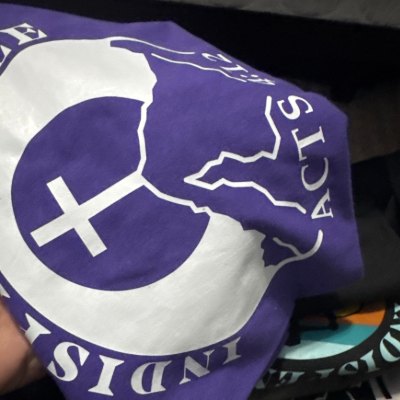 Acts 4:12 Tee Purple ready to ship front